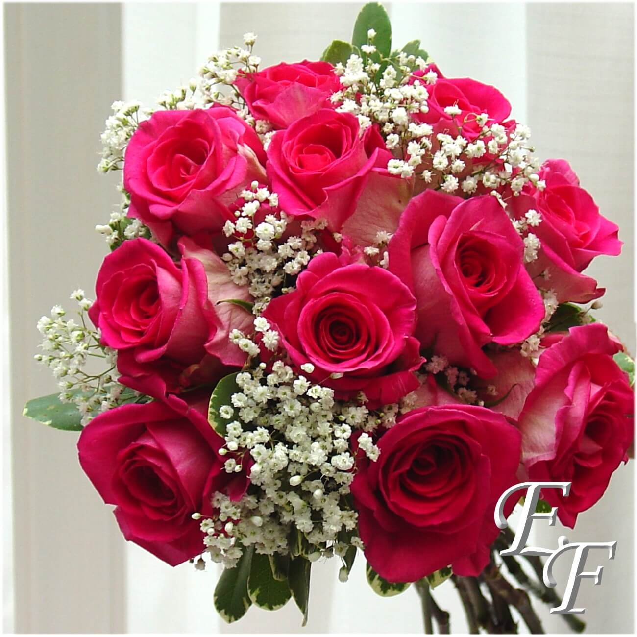 red and pink rose wedding bouquet