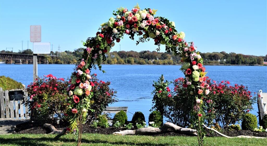 Wedding flower arch on the Chesapeake Bay